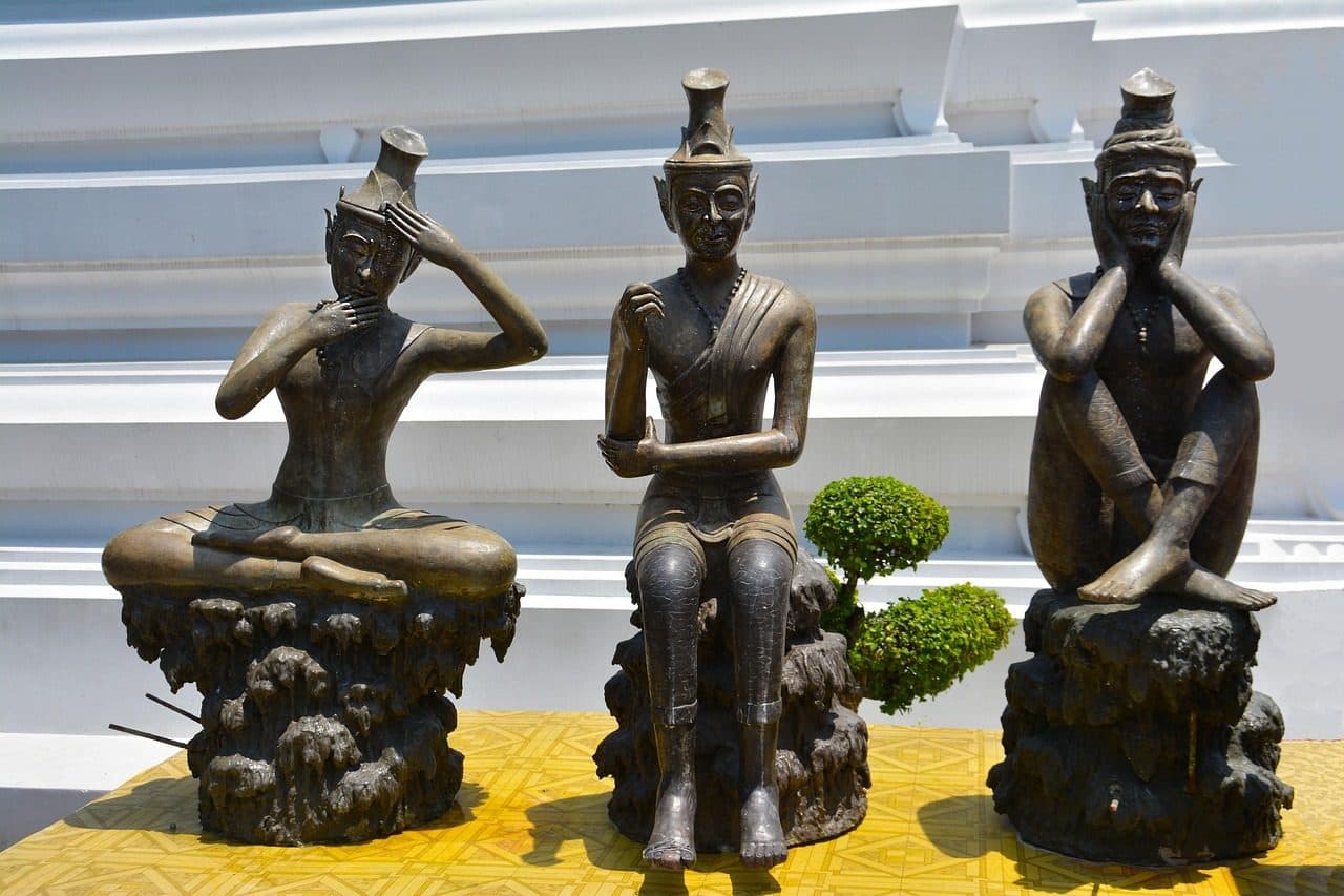 Statues of hermits demonstrating traditional Thai massage and stretching postures